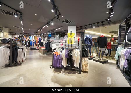 KUALA LUMPUR, MALAYSIA - CIRCA JANUARY, 2020: interior shot of Adidas store in Suria KLCC shopping mall in Kuala Lumpur. Stock Photo