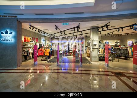 KUALA LUMPUR, MALAYSIA - CIRCA JANUARY, 2020: entrance to Adidas store in Suria KLCC shopping mall in Kuala Lumpur. Stock Photo