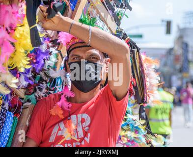 A street vendor selling colorful accessories during the Kadayawan Festival in Davao City, Philippines Stock Photo