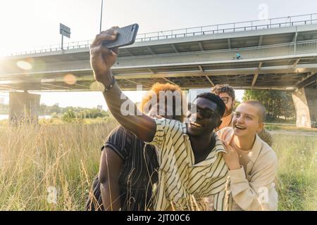 multiracial friends taking a selfie on a beautiful summer day. High quality photo Stock Photo