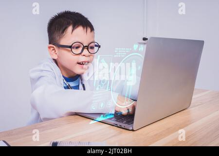 Asian doctor using laptop computer and smartphone for online ...