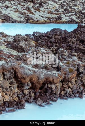 The milky blue waters from the geothermal power station that feed into the Blue Lagoon spa, Iceland. Stock Photo