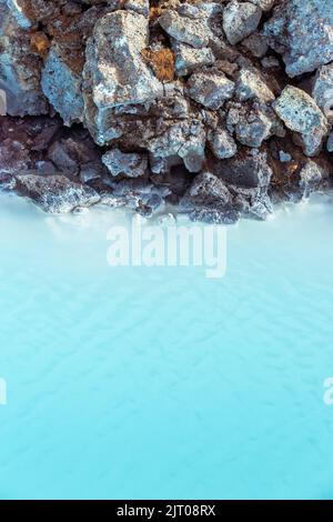 The milky blue waters from the geothermal power station that feed into the Blue Lagoon spa, Iceland. Stock Photo