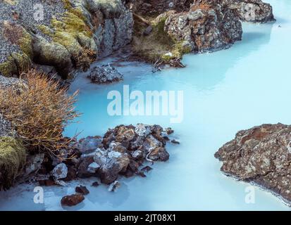 The milky blue waters from the geothermal power station that feed into the Blue Lagoon spa, Iceland. Stock Photo