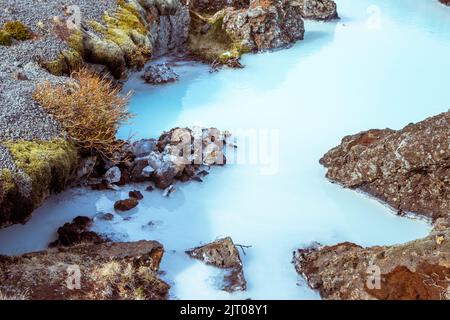 The milky blue waters from the geothermal power station that feed into the Blue Lagoon spa, Iceland. Stock Photo