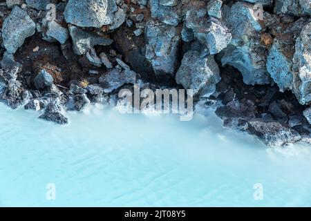 The milky blue waters from the geothermal power station that feed into the Blue Lagoon spa, Iceland. Stock Photo