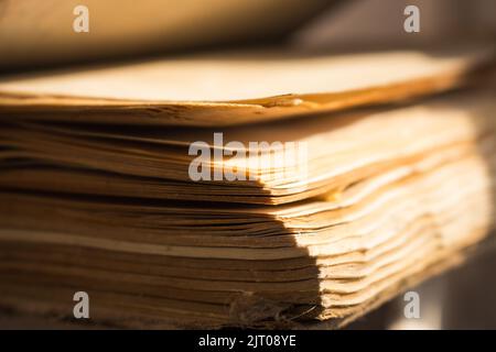 Old weathered book. Education concept. Aged book. Wisdom and knowledge concept. Vintage hardcover of book. School background. Retro literature. Stock Photo