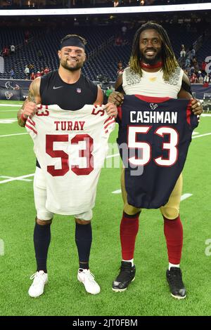 Houston Texans linebacker Blake Cashman (53) and San Francisco 49ers defensive end Kemoko Turay (53) swap jerseys after the NFL game between the San F Stock Photo