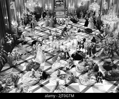 The ALBERTINA RASCH Dancers relaxing between scenes on the Versailles Ballroom Set during filming of MARIE ANTOINETTE 1938 director W.S. VAN DYKE art direction Cedric Gibbons gowns by Gilbert Adrian producer Hunt Stromberg Metro Goldwyn Mayer Stock Photo