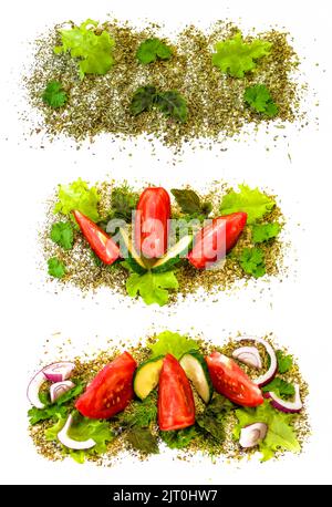 fresh sliced vegetables tomato cucumber posted in the sea salt and spices isolated on white background Stock Photo