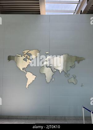 World map image at the airport on the wall. High quality photo Stock Photo