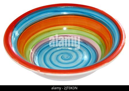 Bright deep dish with a spiral pattern isolated on white, side view Stock Photo