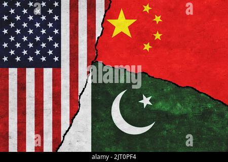 USA, Pakistan and China painted flags on a wall with a crack. United States of America, China and Pakistan relations Stock Photo