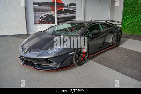 A matte black Lamborghini Aventador SVJ luxury car Stock Photo