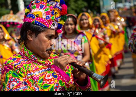 Moscow, Russia. 27th of August, 2022. Members of India's Panghat Performing Arts Group take part in the Spasskaya Tower 2022 International Military Music Festival parade in the VDNKh Exhibition Centre in Moscow, Russia. Nikolay Vinokurov/Alamy Live News Stock Photo
