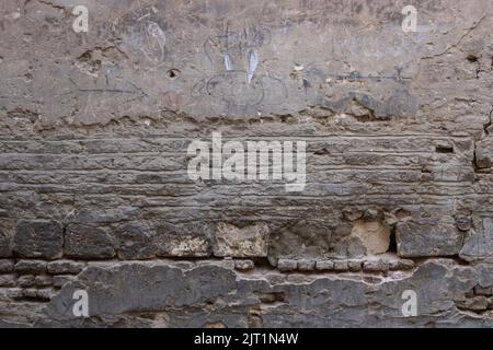 High Quality Old Damaged stone and Brick Dirty wall Stock Photo
