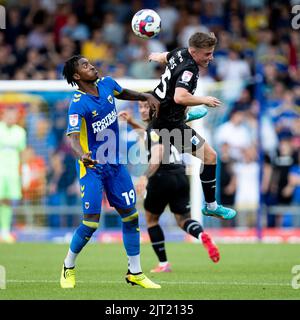 Robbie Gotts of Barrow and Paris Maghoma of AFC Wimbledon battle for the ball during the Sky Bet League 2 match between AFC Wimbledon and Barrow at Plough Lane, Wimbledon on Saturday 27th August 2022. (Credit: Federico Maranesi | MI News) Credit: MI News & Sport /Alamy Live News Stock Photo