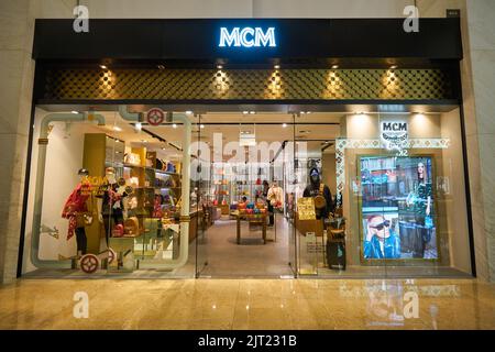 Shenzhen, Guangdong, China. 7th Oct, 2019. Leather luxury goods brand MCM  logo seen in Shenzhen Bao'an International Airport. Credit: Alex Tai/SOPA  Images/ZUMA Wire/Alamy Live News Stock Photo - Alamy