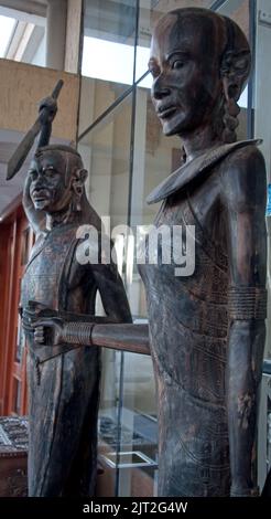 Makonde Statue of Male Warrior (detail) and female,  Dar-es-Salaam, Tanzania, Africa.  The Makonde are a tribe living on the borders between Tanzania Stock Photo