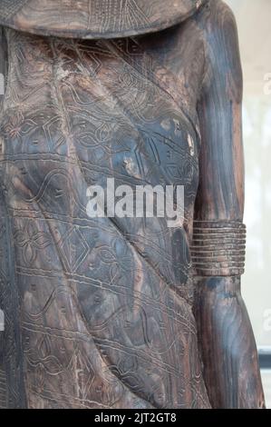 Makonde Statue of Female (detail of dress),  Dar-es-Salaam, Tanzania, Africa.  The Makonde are a tribe living on the borders between Tanzania and Moza Stock Photo