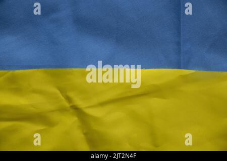 Yellow-blue national flag of Ukraine as a background, stop war and peace in Ukraine Stock Photo