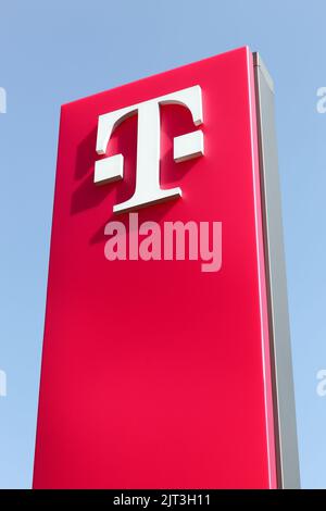 Cologne, Germany - September 2, 2018: Deutsche Telekom sign on a panel. Deutsche Telekom is a German telecommunications company Stock Photo