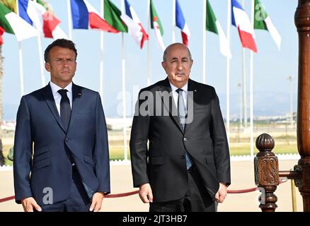(220827) -- ALGIERS, Aug. 27, 2022 (Xinhua) -- Algerian President Abdelmadjid Tebboune (R) holds a seeing-off ceremony for French President Emmanuel Macron in Algiers, Algeria, on Aug. 27, 2022. Algeria and France on Saturday signed a joint declaration for a "renewed partnership" at the end of the three-day visit of French President Emmanuel Macron. (Algerian Presidency/Handout via Xinhua) Stock Photo