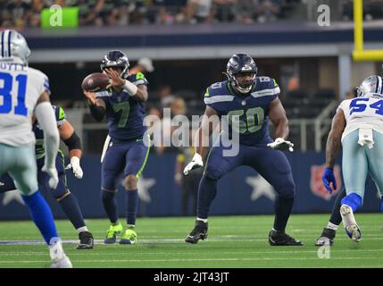 Seattle Seahawks guard Phil Haynes (60) talks to a teammate during