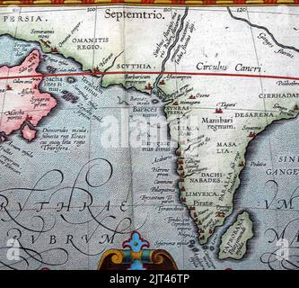 Turning to the principal map based on Arrian's accounts of the expeditions of Alexander the Great we find Ceylon (Sri Lanka) shown as Taprobana, and slithering sea serpents near the mouth of the Indus. Stock Photo