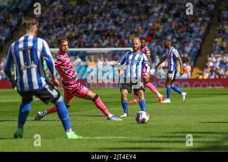 Sheffield, UK. 27th Aug, 2022. Barry Bannan #10 of Sheffield Wednesday passes the ball in Sheffield, United Kingdom on 8/27/2022. (Photo by Gareth Evans/News Images/Sipa USA) Credit: Sipa USA/Alamy Live News Stock Photo