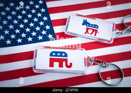 keychains with symbol of US parties. In American politics US parties are represented by either the democrat donkey or republican elephant. August 24, Stock Photo