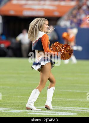 Denver, Colorado, USA. 27th Aug, 2022. A Denver Broncos Cheerleader entertains the crowd during the 2nd. Half at Empower Field at Mile High Saturday night. The Broncos beat the Vikings 23-13. (Credit Image: © Hector Acevedo/ZUMA Press Wire) Stock Photo