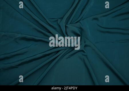 Silk emerald and white soft fabric - wavy silk fabric background -Shiny silk fabric stock photo Stock Photo