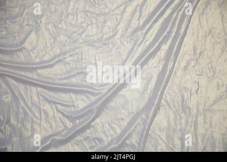 Silk emerald and white soft fabric - wavy silk fabric background -Shiny silk fabric stock photo Stock Photo