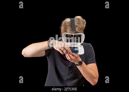 Portrait of a young man with 3D virtual reality glasses. Young man using vr headset, VR goggles Stock Photo