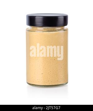 glass jar with peanut paste with black lid isolated on white background  with clipping path Stock Photo