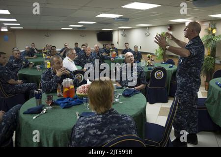 U.S. Navy Vice Adm. Matthew L. Nathan, right, the surgeon general of the Navy and chief of the Navy's Bureau of Medicine and Surgery, speaks to Sailors aboard the hospital ship USNS Mercy (T-AH 19) in Pearl 140629 Stock Photo