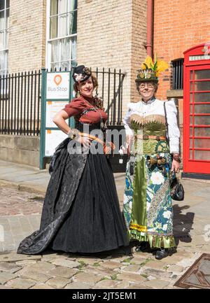 Two ladies dressed up for the Lincoln Steampunk Festival, Castle Hill Lincoln 2022 Stock Photo