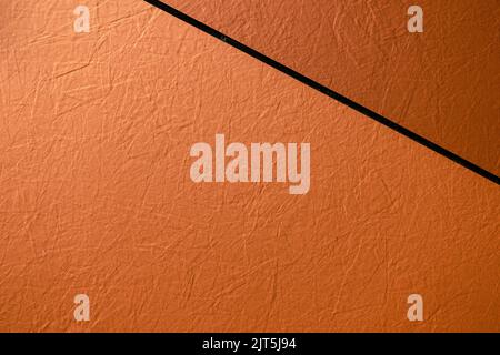 Brown colored house front texture background. Abstract grunge decorative light brown wall background Stock Photo