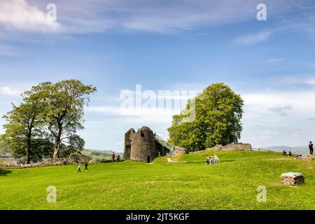 14 May 2022:Kendal, Cumbria, UK - The Castle on a fine spring day, with trees, grass and people walking around. Stock Photo