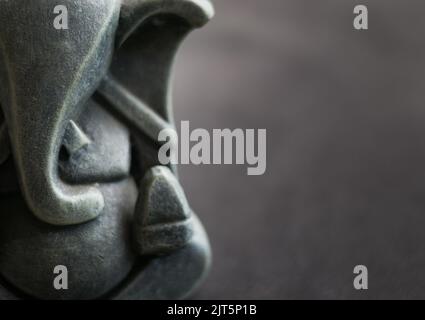 idol of lord ganesha for worshipping during ganesh chaturthi festival in maharashtra india. shot against black background. Stock Photo