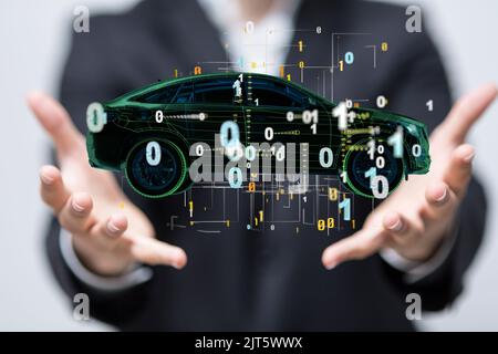 A 3D rendered car icon hovering in mans hand Stock Photo