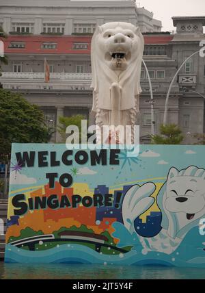 The Merlion, Singapore River, Singapore.  Half-lion and half fish, the merlion is one of Singapore's icons and stands overlooking the Singapore River. Stock Photo