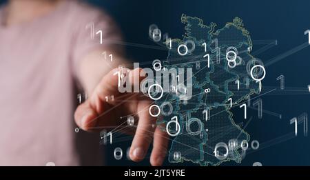 A 3D rendered German map hovering in man's hand Stock Photo