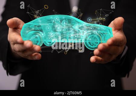 A 3D rendered car icon hovering in mans hand Stock Photo