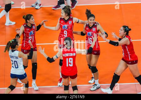 Pasig City, Philippines. 28th Aug, 2022. Players of Thailand celebrate scoring during the semifinals match against China at the 2022 AVC Cup for Women at the Philsports Arena in Pasig City, the Philippines, Aug. 28, 2022. Credit: Rouelle Umali/Xinhua/Alamy Live News Stock Photo