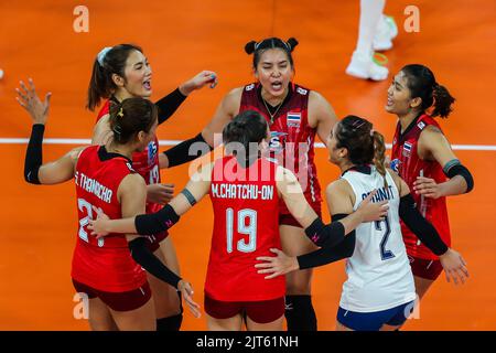 Pasig City, Philippines. 28th Aug, 2022. Players of Thailand celebrate scoring during the semifinals match against China at the 2022 AVC Cup for Women at the Philsports Arena in Pasig City, the Philippines, Aug. 28, 2022. Credit: Rouelle Umali/Xinhua/Alamy Live News Stock Photo