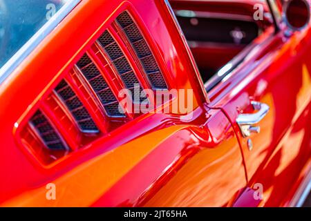 Statesboro, GA - May 17, 2014: Shallow depth of field closeup of the vent louver details on a 1965 Ford Mustang 2+2 Fastback. Stock Photo