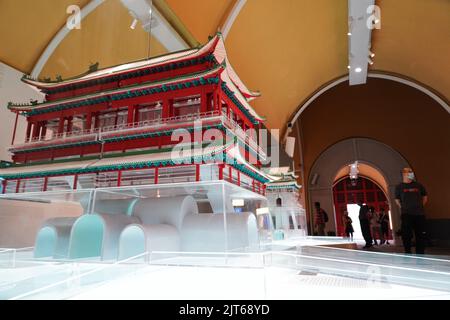 (220828) -- BEIJING, Aug. 28, 2022 (Xinhua) -- People visit an exhibition at the ground floor of Gulou, a historic drum tower, in Beijing, capital of China, Aug. 28, 2022. An exhibition has recently been in trial operation at Gulou of Beijing, which explains the ancient timekeeping function, architectural features, folk culture in surrounding areas and its relationship with Beijing's central axis through an immersive and interactive experience. (Xinhua/Chen Zhonghao) Stock Photo