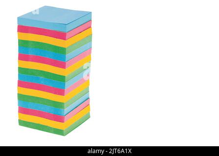 Close up of multi-colored postal packages stacked isolated on white background. Stock Photo